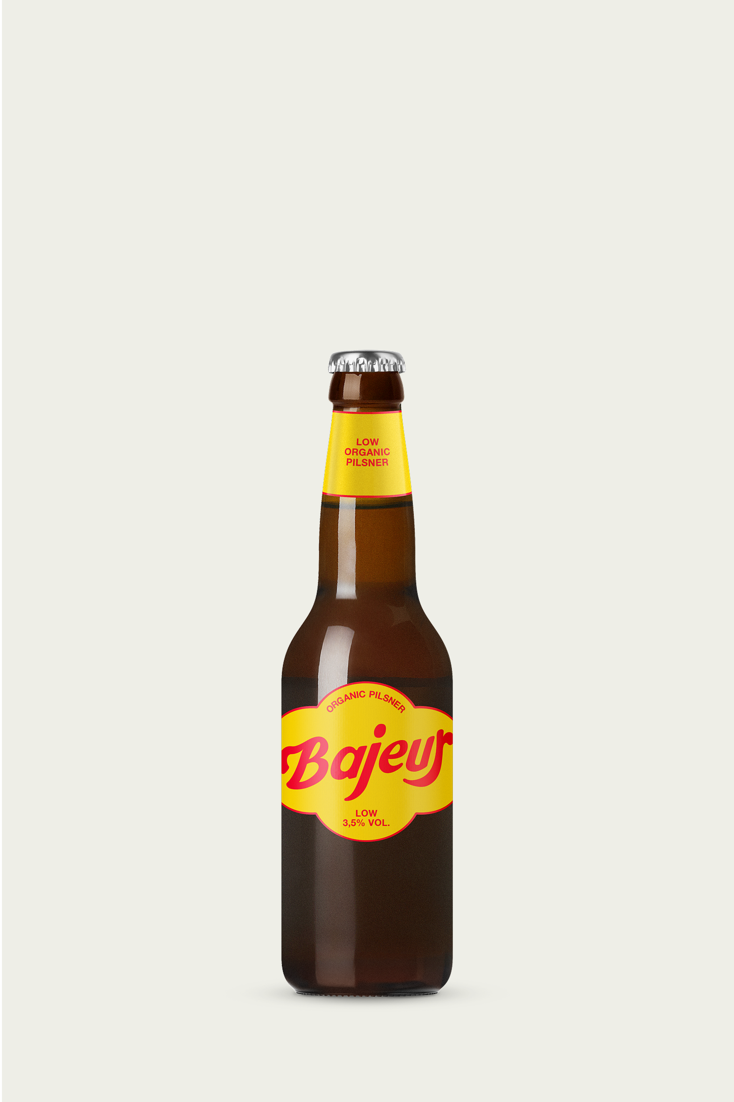 Bottle of Bajeur Low organic pilsner with a yellow label on a white background