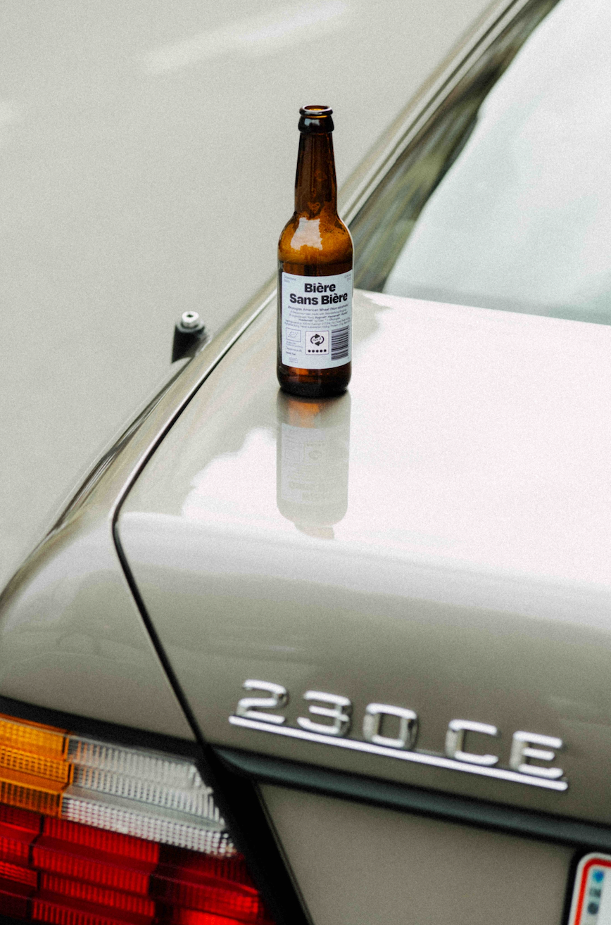 Bière Sans Bière sitting on the trunk of a car. 