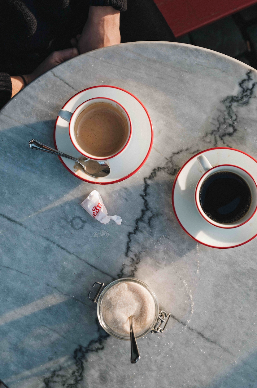 Two cups of Depanneur's OKO ground coffee in cups at a local cafe in Copenhagen. 
